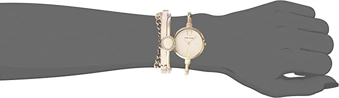 Anne Klein Women's AK/3290LPST Gold-Tone Bangle Watch and Swarovski Crystal Accented Bracelet Set